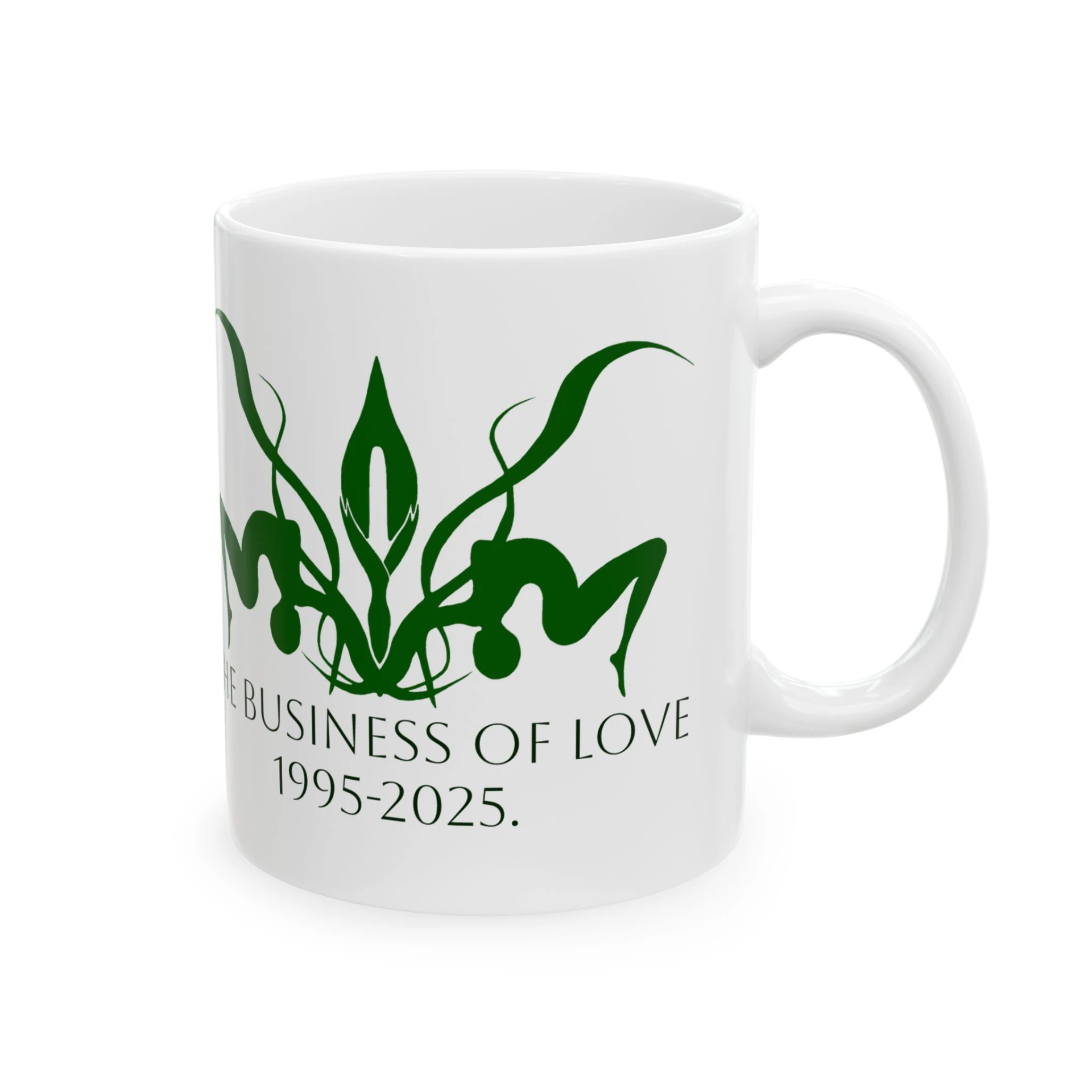 White mug with a green Punany flower and The Business of Love 1995-2025